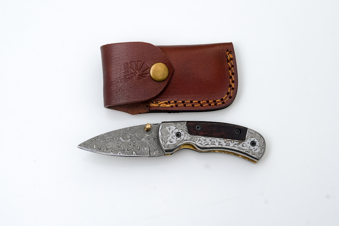 Hand-Forged Damascus Folding Knife | Engraved Bolster, Dark Wood Handle & Intricate Spine File Work